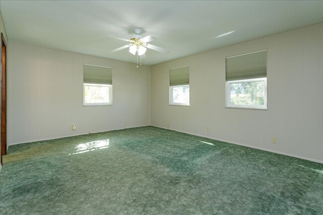 Building Photo - Run don't walk for this one of a kind beautifully maintained Old Florida Charmer on a park like d...