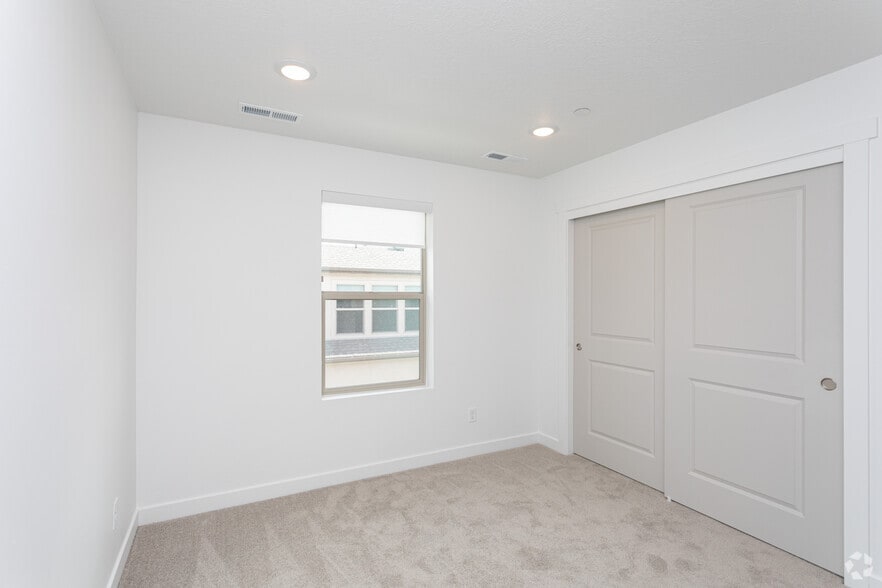 1BR, 1.5BA - 775SF - Bedroom - Innovation Park at Holbrook Farms