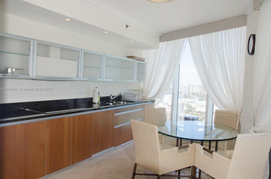Building Photo - 17201 Collins Ave