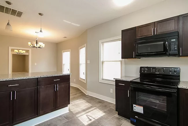 Kitchen looking into Dining Room - 1899 W 52nd St