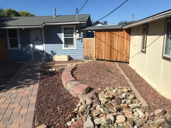 Building Photo - 1 month free rent! Private yard and storage shed.