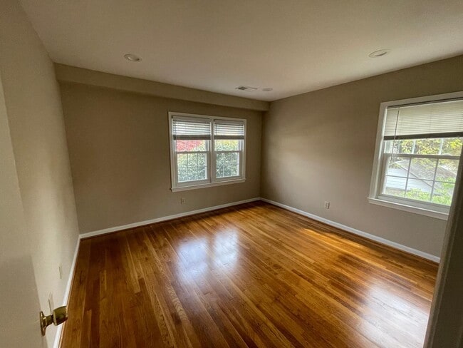 Building Photo - A fully updated Four Bedroom, Three and On...