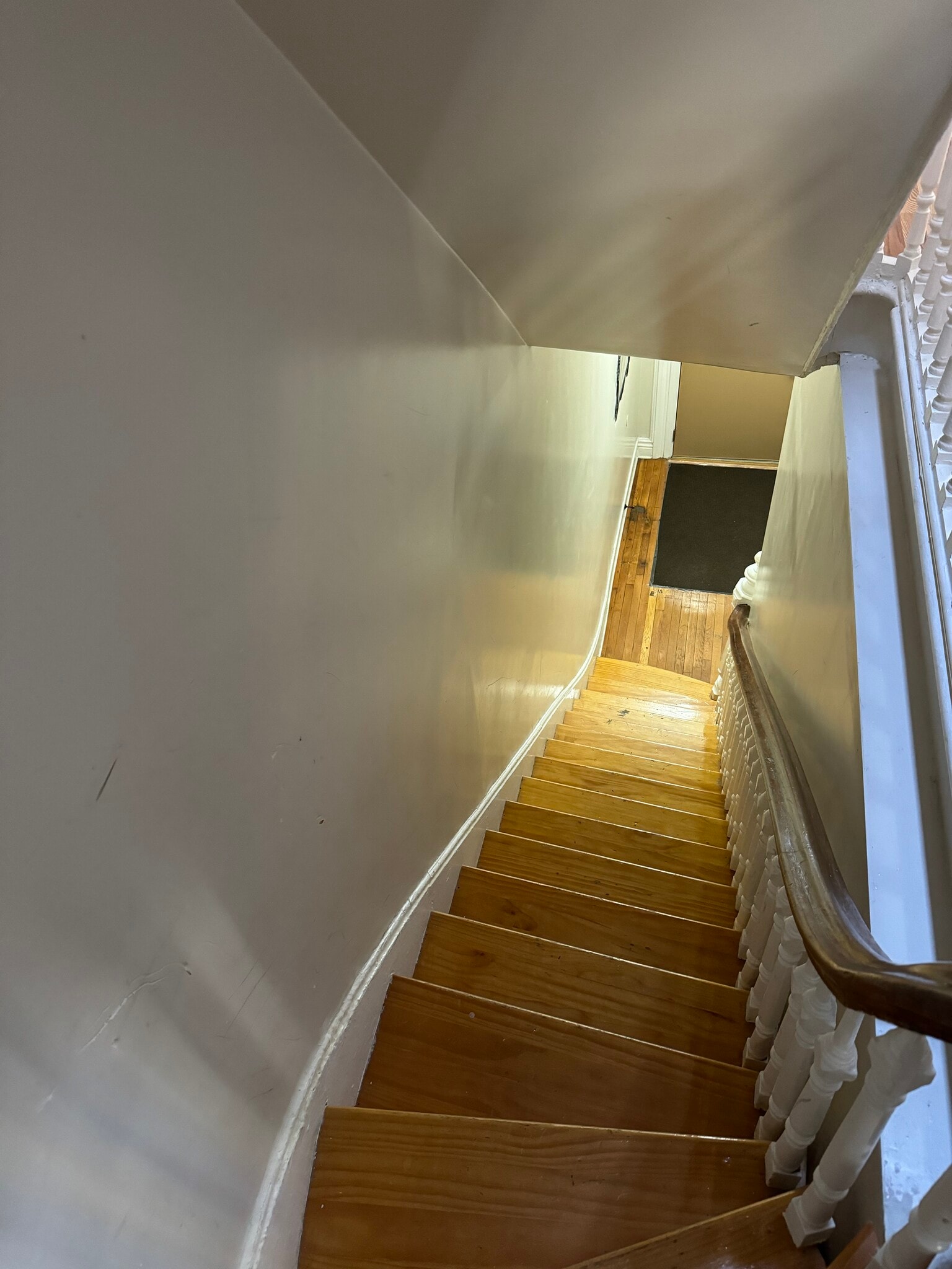 Hallway looking down to exit the apartment - 373 4th St