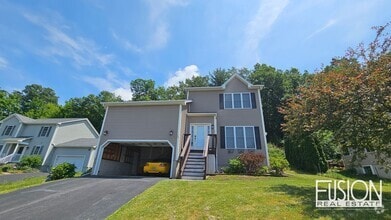 Building Photo - FREE July Rent for this Quiet, Four Bedroo...
