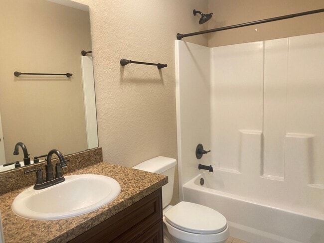 Building Photo - Maintenance-Free 4 Bedroom Rental!