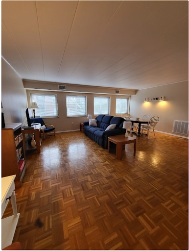Combination living and dining space with excellent natural light - 1005 Woodrow Ave