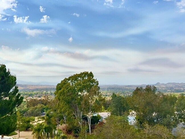 Building Photo - Resort-Style 55+ Living  in this Remodeled Home with Panoramic Views