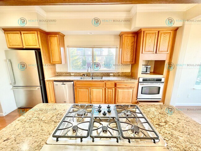 Building Photo - Stunning 3-Bedroom Townhome with Panoramic City Views, Upgraded Kitchen & Spacious Living in Nort...