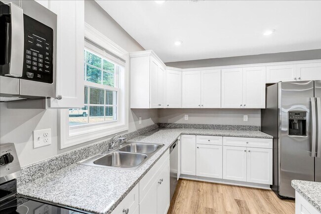 Building Photo - New Construction 3 Bedroom/2 Bathroom Homes with Garage