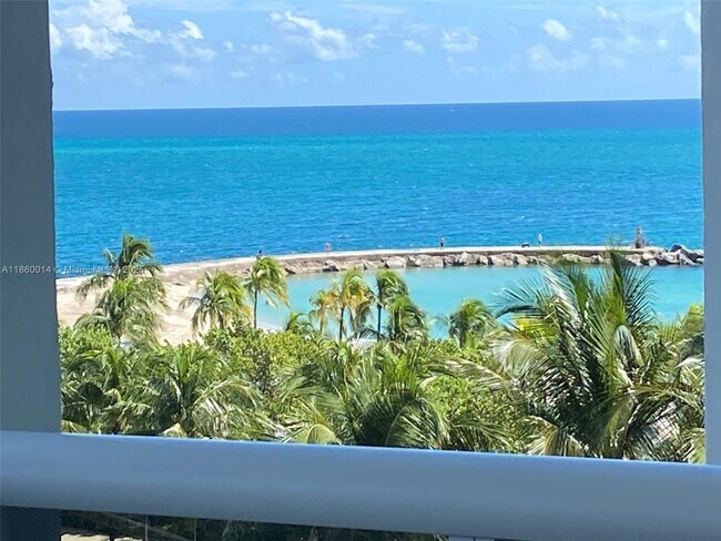 Building Photo - 10275 Collins Ave