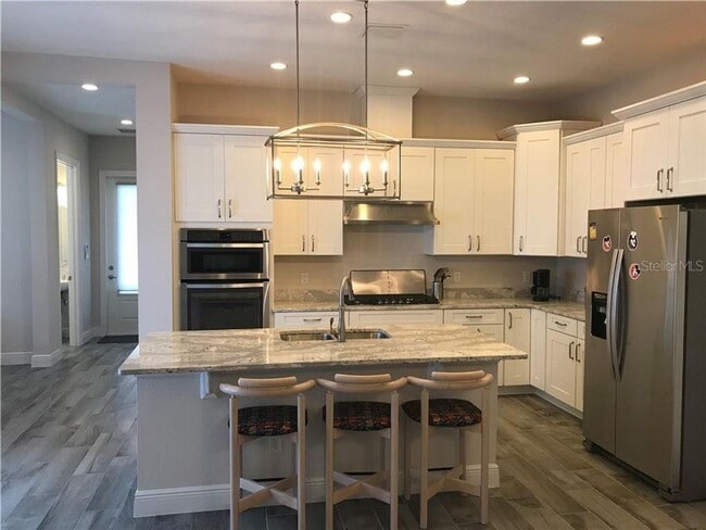 Building Photo - 8896 Bismarck Palm Dr
