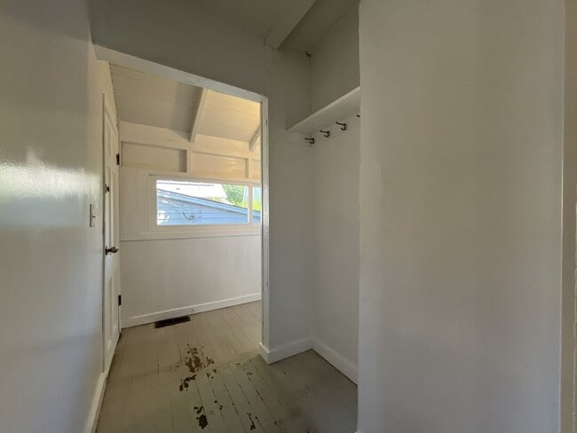 Building Photo - Charming Cottage with Hardwood Flooring, Modern Kitchen & Beautiful Outdoor Living Areas