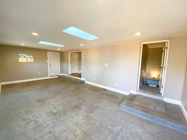 Building Photo - Spacious & Updated Home in Lakewood!-Open Floor plan, Outdoor Living Space, Garden Beds, & More!!!
