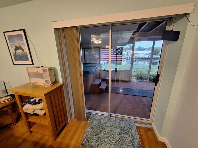 Building Photo - Gulf Access Home on Canal Available Now