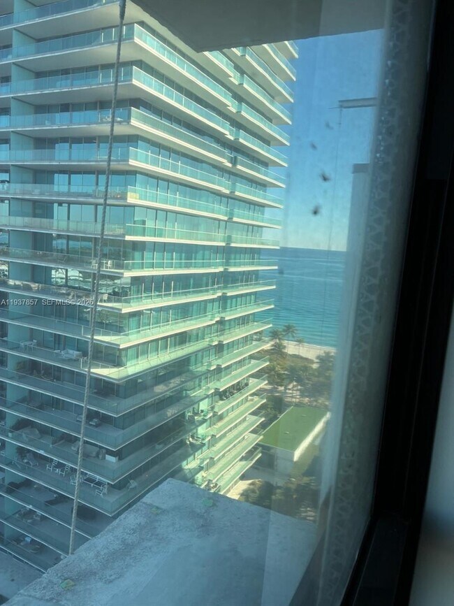 Building Photo - 10185 Collins Ave