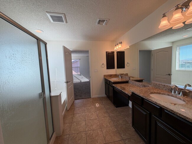 Building Photo - 4 Bedroom + Office Home Available Near Loma Colorado Blvd NE & Broadmoor Blvd NE in Rio Rancho!
