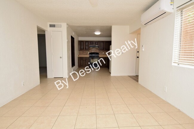 Building Photo - Updated 2 Bed 1 Bath Duplex with Fresh Paint, Ductless Heating/Cooling and Private Yard