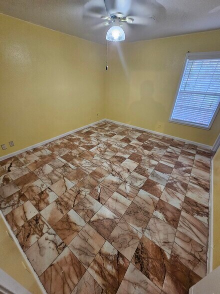 Bedroom 1 with closet and celing fan - 618 Land O Lakes Dr