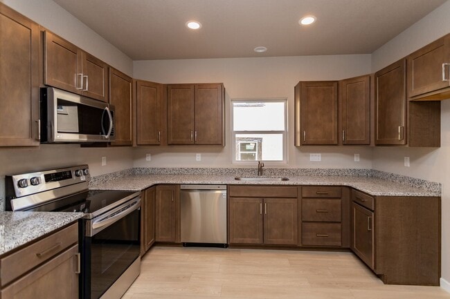 Building Photo - Unveiling Luxury Living: Townhomes with Ma...