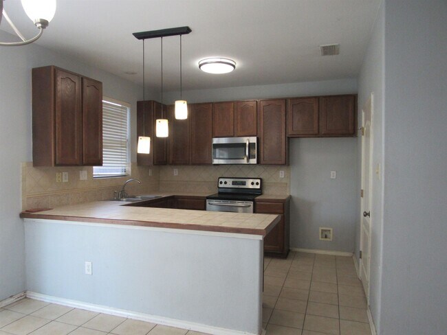 Building Photo - 9310 Albany Dr