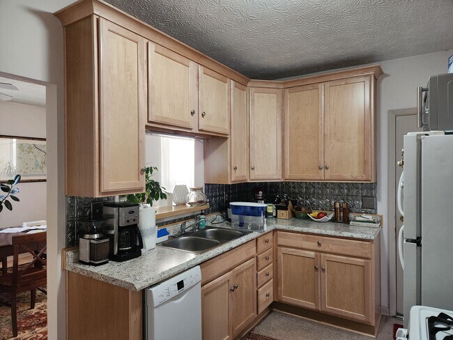 Kitchen with Maple Cabinets - 224 W 3rd Ave