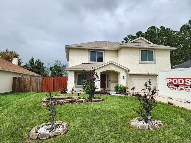 Building Photo - 4 Bedroom 2.5 Bath with in ground pool loc...