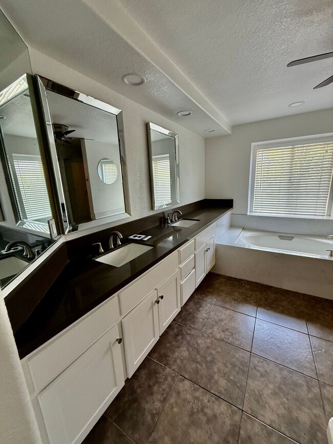 Building Photo - Spacious 4 Bedroom, 3 Bath Home with 3-Car Garage & Landscaping Included