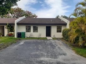 Two dedicated parking spaces in front of the unit. - 13928 SW 52nd Ln