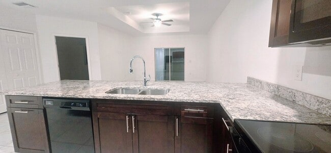 Building Photo - MUST SEE -2/2/1+OPEN DEN-DUPLEX IN GREENBR...