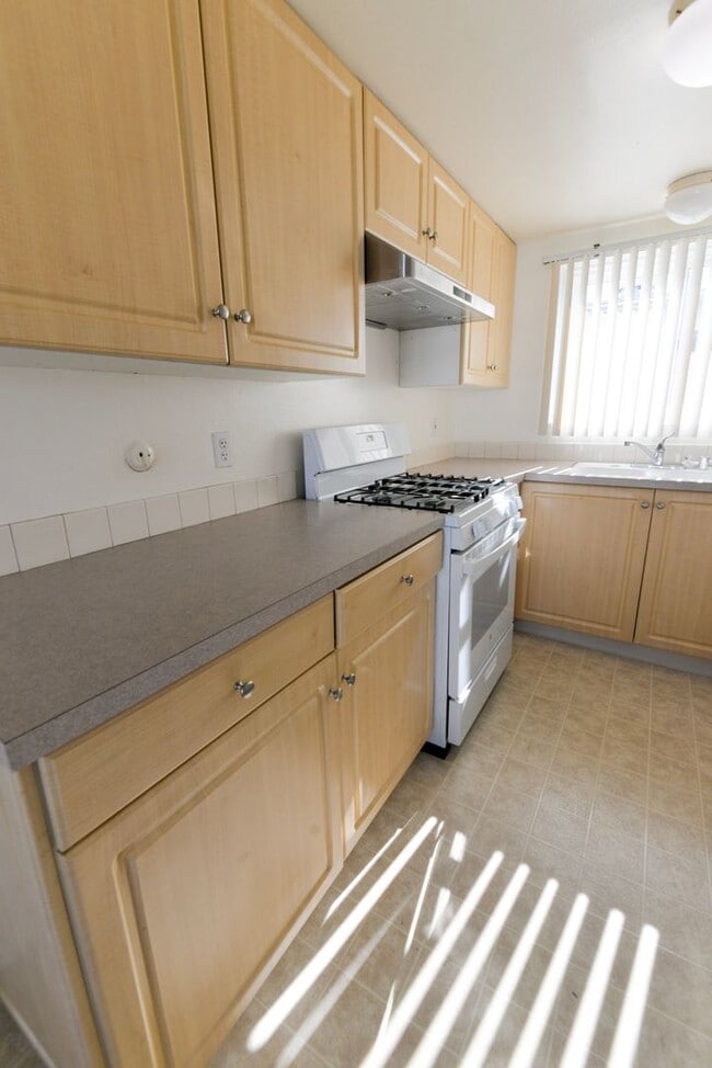 Building Photo - Sunny 2BR/2BA Coastal Retreat — Steps from the Sand with Ocean Breezes