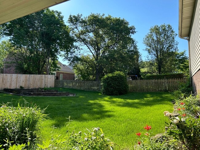 Building Photo - 4 Bedrooms with Finished Basement and Bonu...
