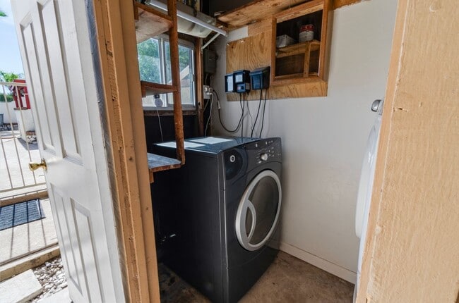 Building Photo - Available March 1, 2026. Updated 2 Bedroom 1.5 Bath Duplex with private dedicated pool.