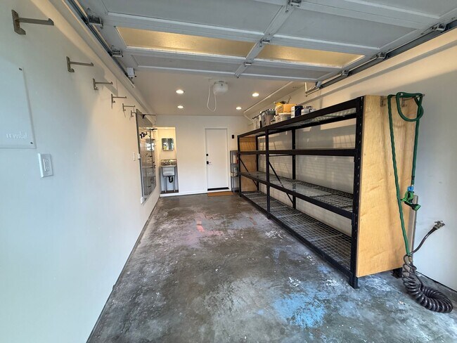 Building Photo - STUNNING THREE BEDROOM PLUS OFFICE MARINER GREEN CONDO WITH GREAT OUTDOOR SPACE