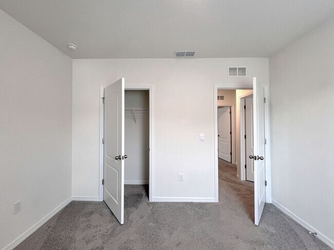 Building Photo - Four-Bedroom Home with Modern Finishes & Open Layout