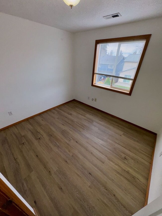 Building Photo - Spacious 4BR Home with Fenced Yard, 2-Car Garage & Convenient Location