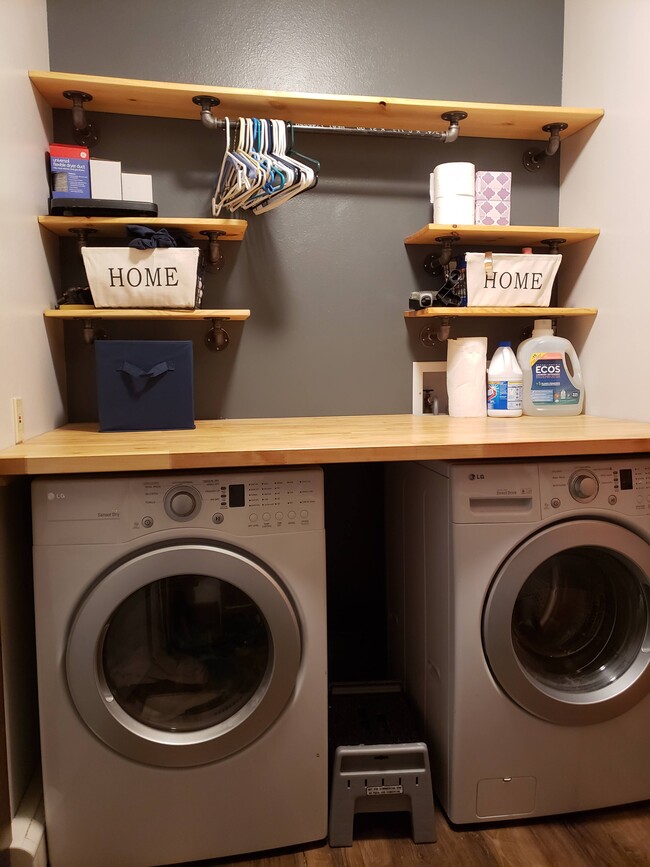 Functional storage in the laundry room, leads to garage - 7 Willowbrook Close