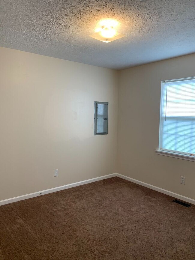 Building Photo - Adorable 3 Bedroom Home with Large Yard!...