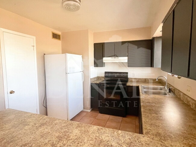 Building Photo - 410 E Desert Dr