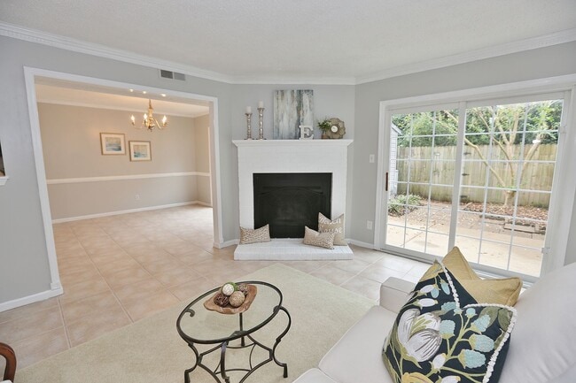 Building Photo - MUST SEE! Charming 3-Bedroom Townhome in Thoroughgood! 1-Car Attached Garage!