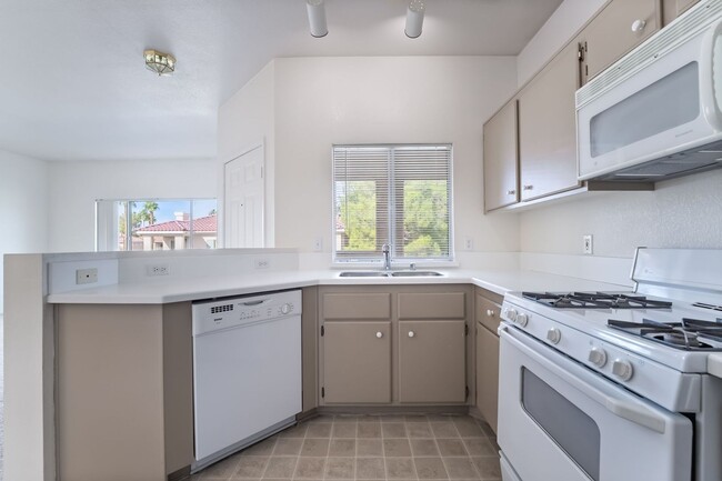 Building Photo - Charming Henderson Condo in Gated Community with Pool Access!