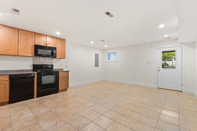 Building Photo - Charming One-Bedroom Basement Apartment