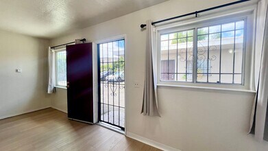 Building Photo - Cozy 1-bdrm, 1-bath in gated complex, includes 1 parking space, Located steps from schools and Hi...