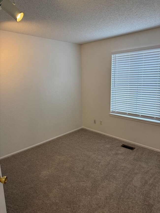 Building Photo - Spacious 4-Bedroom Ranch with Finished Bas...