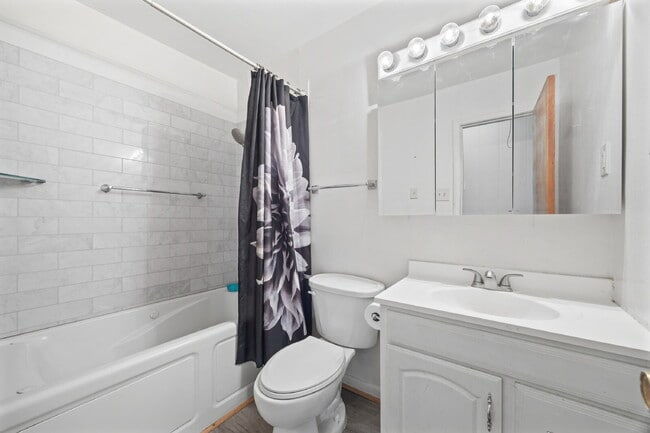 Building Photo - Classic Brick Ranch with 24x24 Workshop, Fenced Yard & Garden Beds