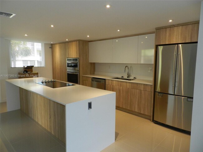 Building Photo - 10230 Collins Ave