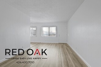 Building Photo - 15901 S Vermont Ave