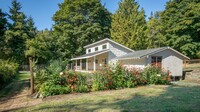 Building Photo - Quiet Cottage Feel and a Gardners Dream!!!