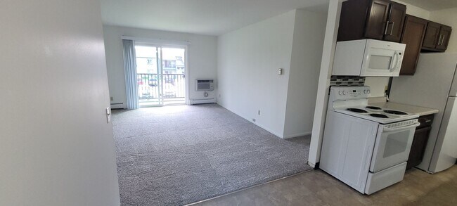 Building Photo - Upper 2 Bedroom Apartment – Heat Included - Available: First Week of June  2026