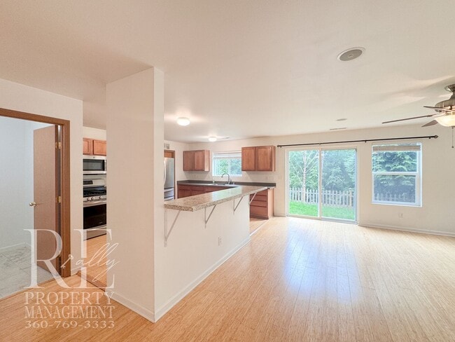 Building Photo - Spacious 4-Bedroom Home with Brand-New Carpet, Two Living Areas & Loft