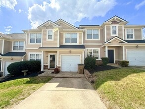 Building Photo - Beautifully Renovated 3 Bedroom 2.5 Bath Townhome with Garage! Pet Friendly!